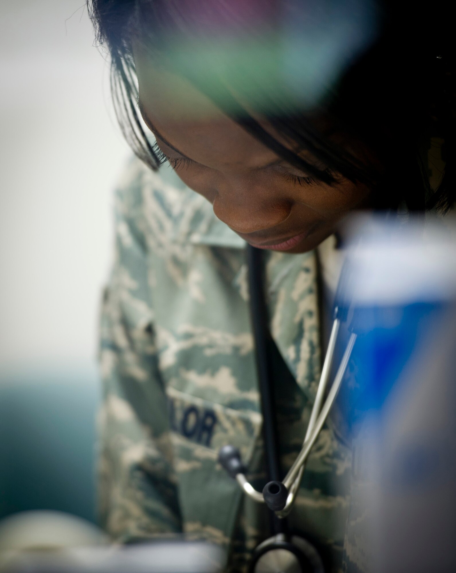 YOKOTA AIR BASE, Japan -- Staff Sgt. Raven Taylor, 374th Medical Operations Squadron medical technician, reviews patient records at Yokota Air Base, Japan, July 8, 2011. Sergeant Taylor was named one of the Air Force's 12 Outstanding Airmen of the Year for 2011 for her work at her previous base, Eielson Air Force Base, Alaska. (U.S. Air Force photo/Staff Sgt. Samuel Morse)