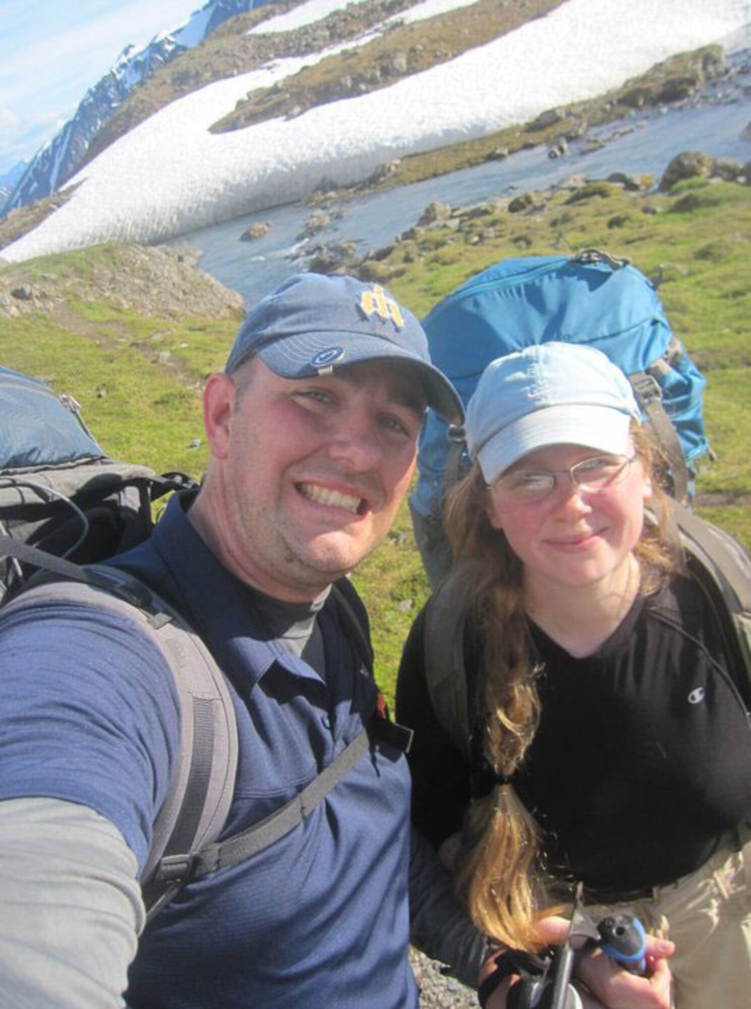 Army Staff Sgt. Trevor Jones of the 59th Signal Battalion and his wife Sarah
pause while hiking the Crow Pass trail from Girdwood to Eagle River.(Photo courtesy of Arctic Warrior readers)
