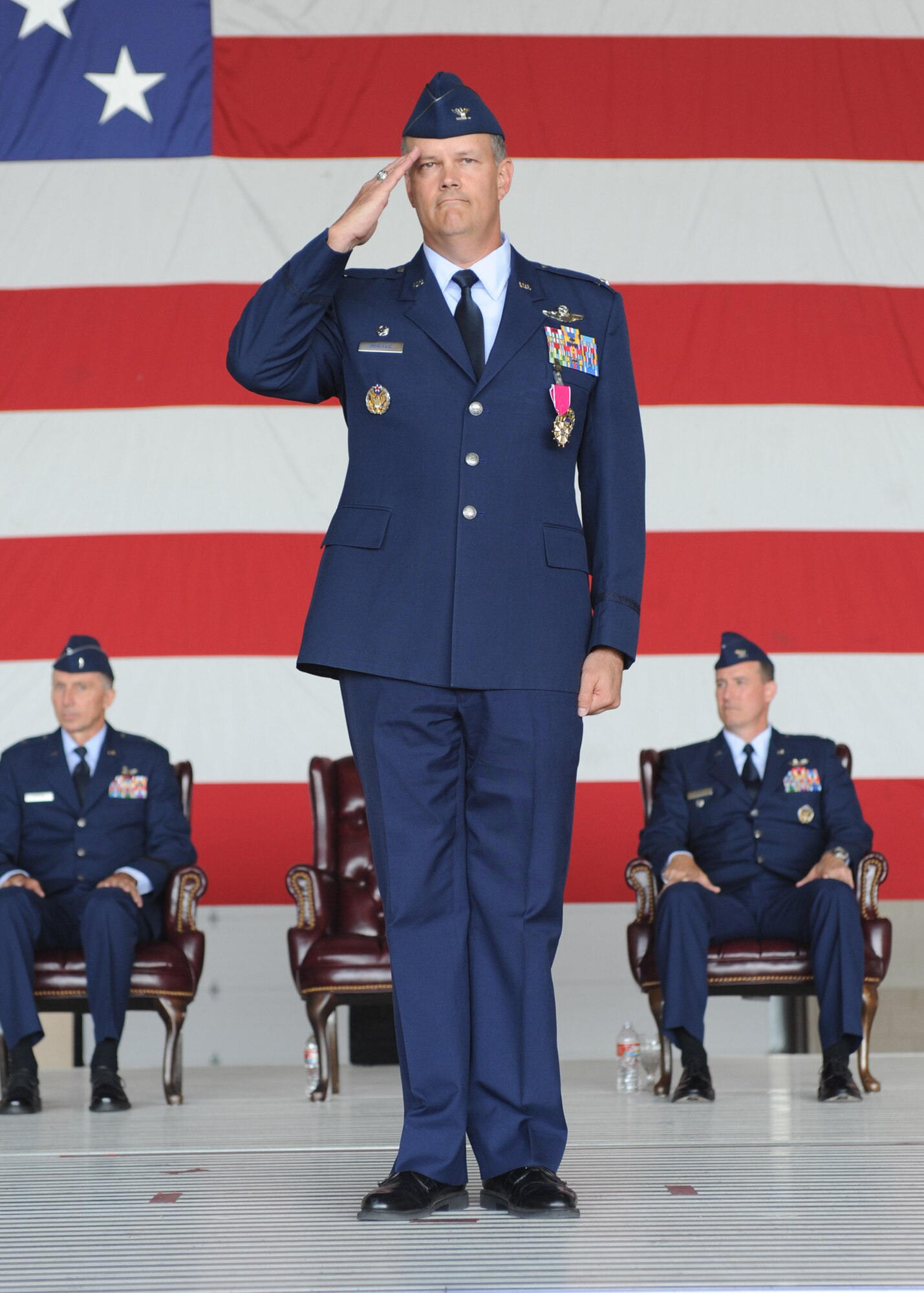 Col. Don Shaffer is rendered one final salute from the Warriors of the North after relinquishing command to Col. Timothy Bush during a change-of-command ceremony July 13 on Grand Forks Air Force Base, N.D. (U.S. Air Force photo/Staff Sgt. Suellyn Nuckolls)