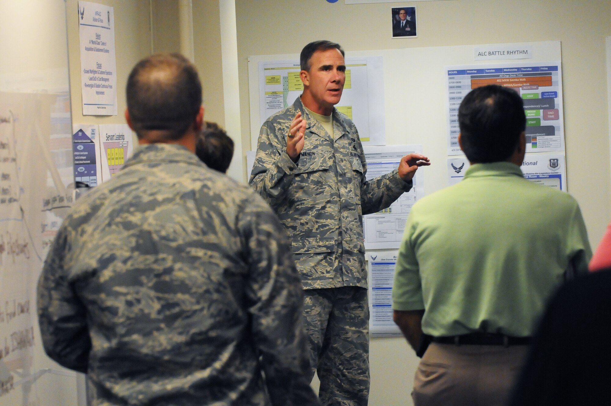 Maj. Gen. Robert McMahon talks with Base leaders in the  new mission control room. U. S. Air Force photo by Sue Sapp