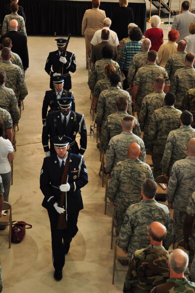 WRIGHT-PATTERSON AIR FORCE BASE, Ohio – The 445th Airlift Wing's Honor Guard marches down the aisle at the start of the Wing’s C-17 Welcome Ceremony July 9. More than 600 people attended the event which included featured speakers David Hobson, former U.S. Representative Ohio’s 7th District, Lt. Gen. Charles Stenner Jr., Air Force Reserve Command commander, retired Brig. Gen. Howard Ingersoll, the Boeing Company representative, and Col. Stephen Goeman, 445th Airlift Wing commander. (U.S. Air Force photo/Senior Airman Mikhail Berlin)