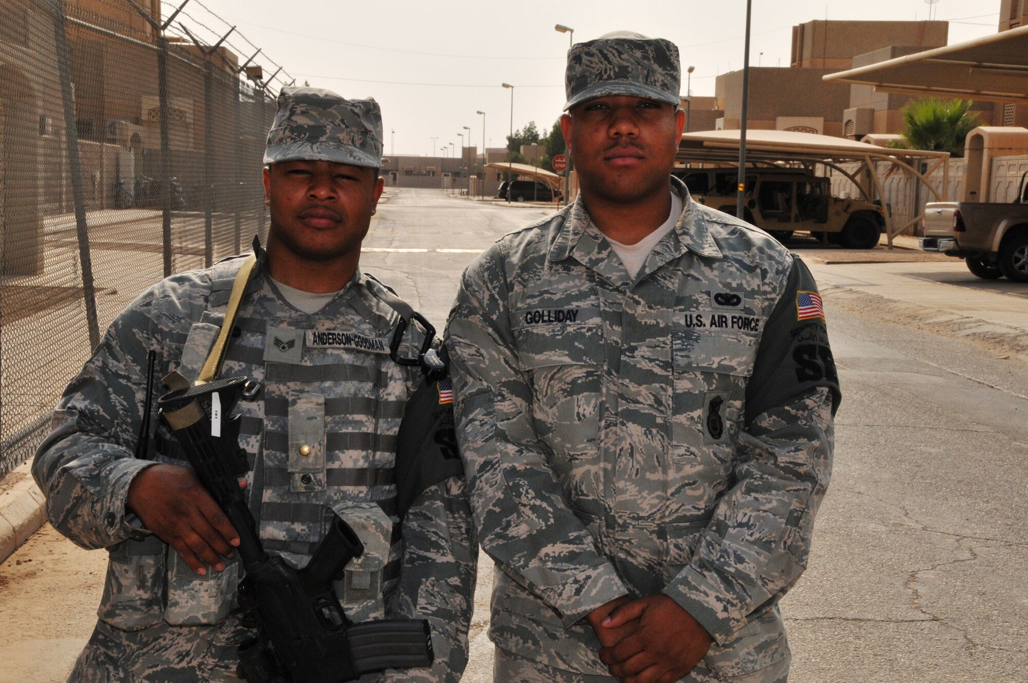 Senior Airman Charles Anderson-Goodman and Airman 1st Class Reginald Golliday on duty in Southwest Asia. The Airmen voluntarily deployed less than three months after facing a gunman’s bullets during the attack on a military bus at the Frankfurt airport in Germany. Both are deployed to the 64th Air Expeditionary Group from the 48th Security Forces Squadron at Royal Air Force Lakenheath, England. (U.S. Air Force photo/Master Sgt. Mike Hammond)