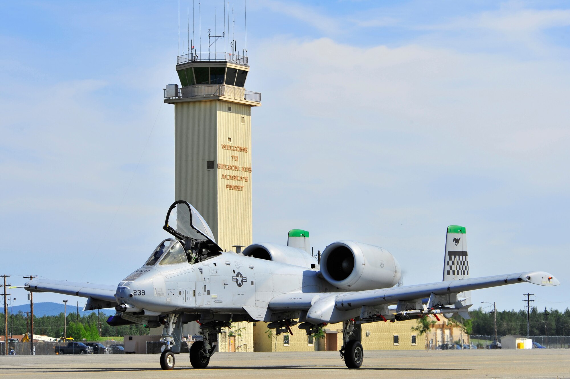 An A-10 Thunderbolt II taxis past the air traffic control tower during RED FLAG-Alaska 11-2 July 11, 2011, Eielson Air Force Base, Alaska. RF-A, a two week long exercise, focuses on aerial combat training for U.S. and allied forces and is conducted within the Joint Pacific Alaska Range Complex, a 67,000 square mile training range. The A-10 is assigned to the 25th Fighter Squadron at Osan Air Base, Republic of Korea (U.S. Air Force photo/Staff Sgt. Christopher Boitz)