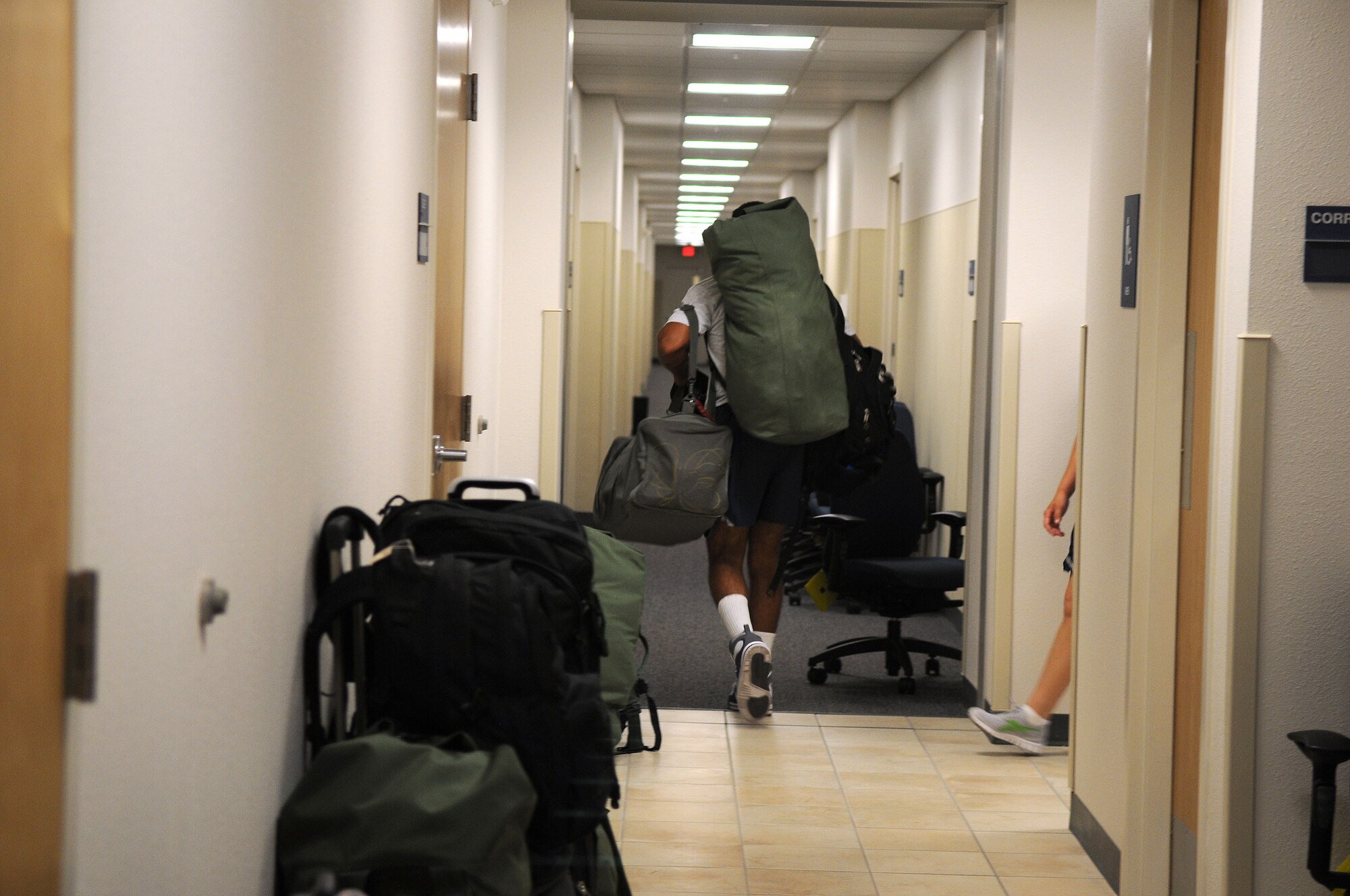 GOODFELLOW AIR FORCE BASE, Texas -- The first wave of 315th Training Squadron Airmen move into a newly built dormitory here July 11. This move will relocate 600+ Airmen allowing for a better quality of life for students.(U.S. Air Force photo/Senior Airman. Heather L. Rodgers)
