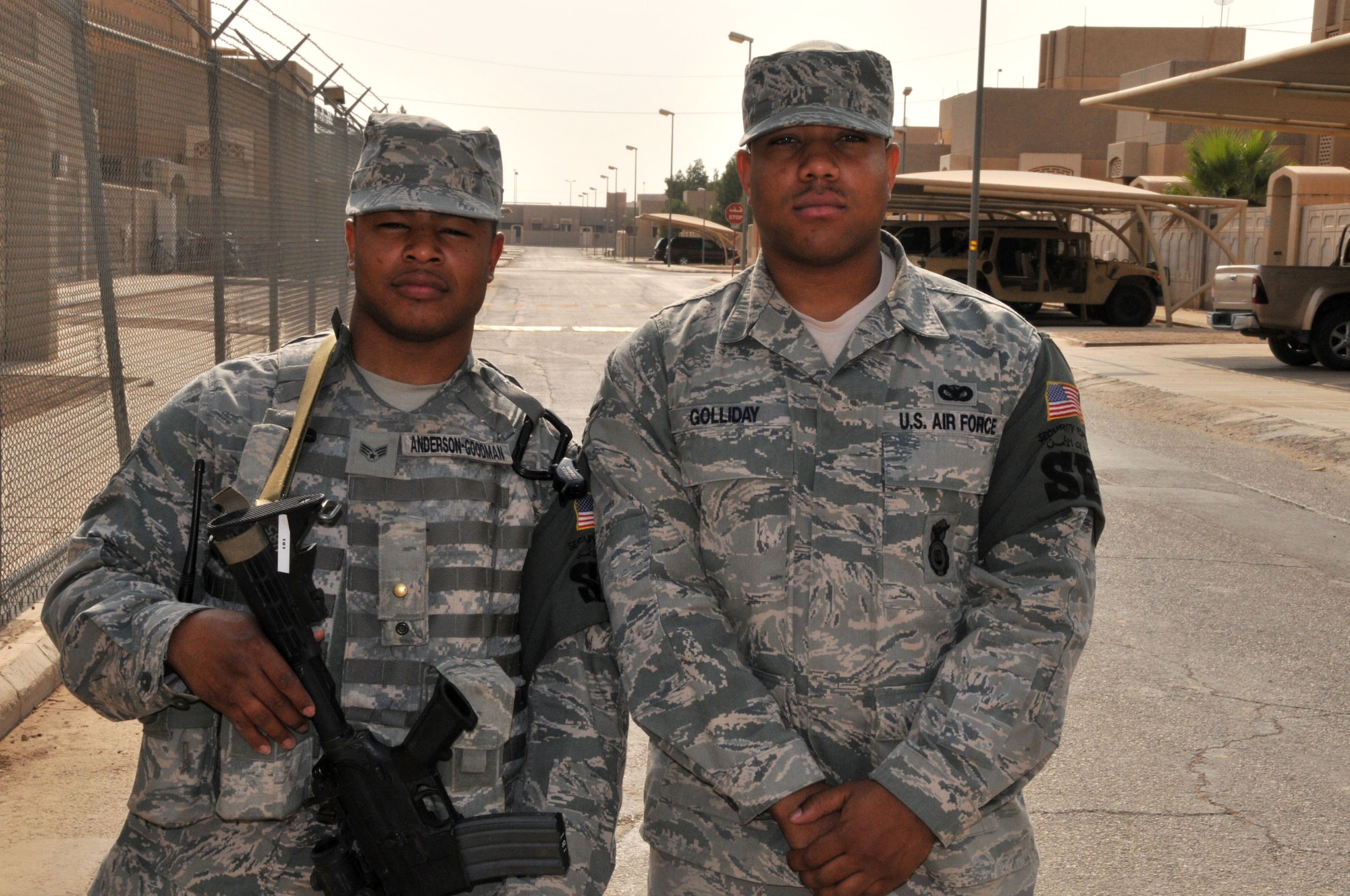 Senior Airman Charles Anderson-Goodman and Airman 1st Class Reginald Golliday on duty in Southwest Asia. The Airmen voluntarily deployed less than three months after facing a gunman’s bullets during the attack on a military bus at the Frankfurt airport in Germany. Both are deployed to the 64th Air Expeditionary Group from the 48th Security Forces Squadron at Royal Air Force Lakenheath, England. (U.S. Air Force photo/Master Sgt. Mike Hammond)