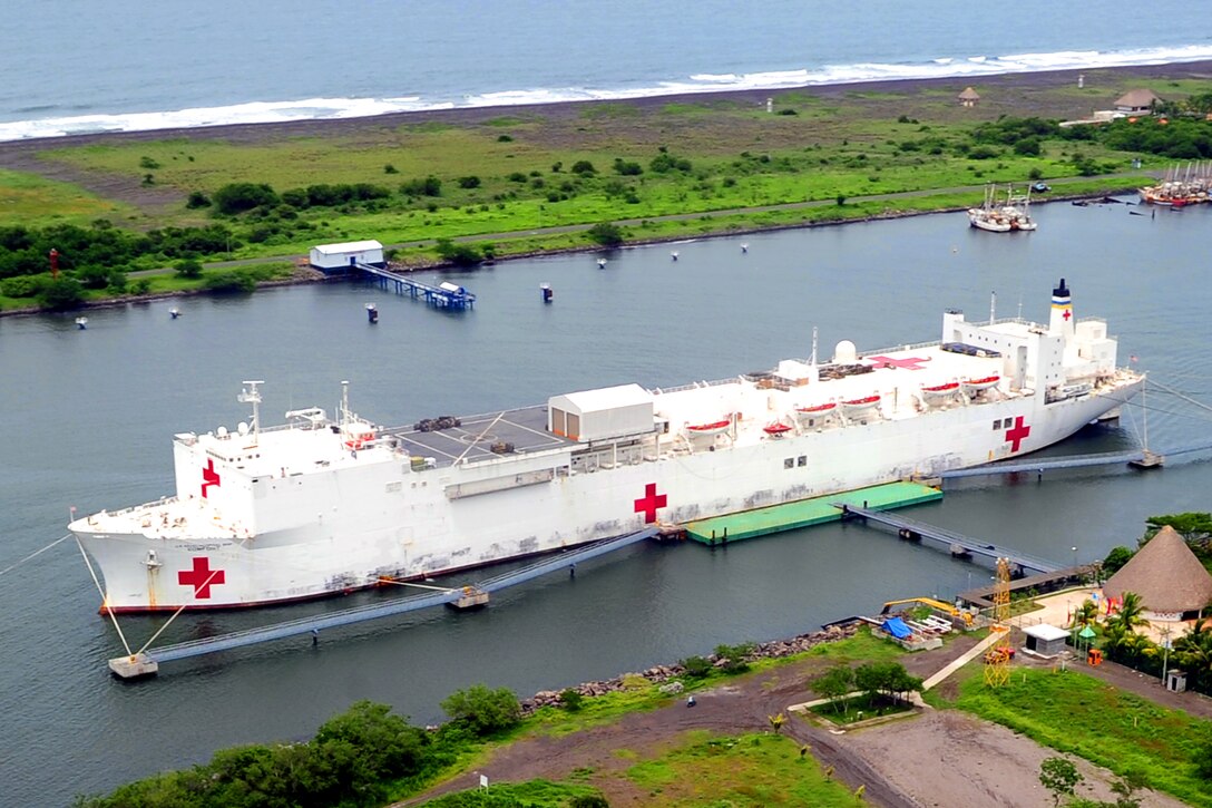 The hospital ship USNS Comfort sits pierside during a Continuing Promise 2011 mission to Puerto San Jose, Guatemala, June 30, 2011. Continuing Promise is a five-month humanitarian assistance mission to countries in the Caribbean, Central and South America.