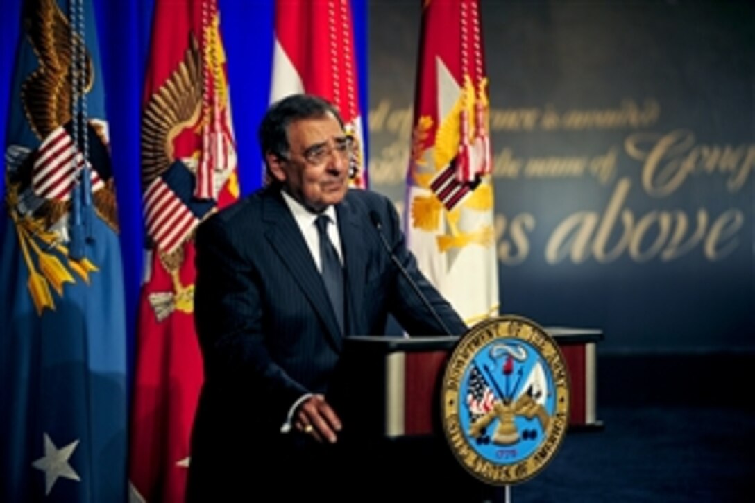 Defense Secretary Leon E. Panetta speaks at a ceremony honoring Medal of Honor recipient Army Sgt. 1st Class Leroy Petry as he is inducted into the Hall of Heroes at the Pentagon, July 13, 2011.