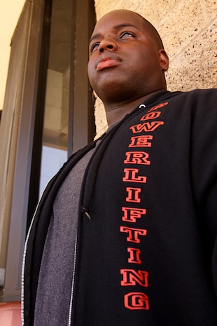 Sergeant David “The Beast” Douglas, an automotive organizational mechanic for 1st Maintenance Battalion, bench pressed 738.5 pounds during the United States Powerlifting Association Nationals in Costa Mesa, CA, July 3. Douglas is also Camp Pendleton’s Powerlifting Team’s captain and was selected to compete in this year’s Mr. Olympia Pro Powerlifting Competition.