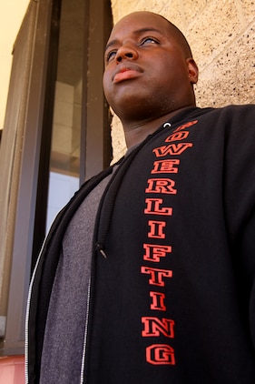 Sergeant David “The Beast” Douglas, an automotive organizational mechanic for 1st Maintenance Battalion, bench pressed 738.5 pounds during the United States Powerlifting Association Nationals in Costa Mesa, CA, July 3. Douglas is also Camp Pendleton’s Powerlifting Team’s captain and was selected to compete in this year’s Mr. Olympia Pro Powerlifting Competition.