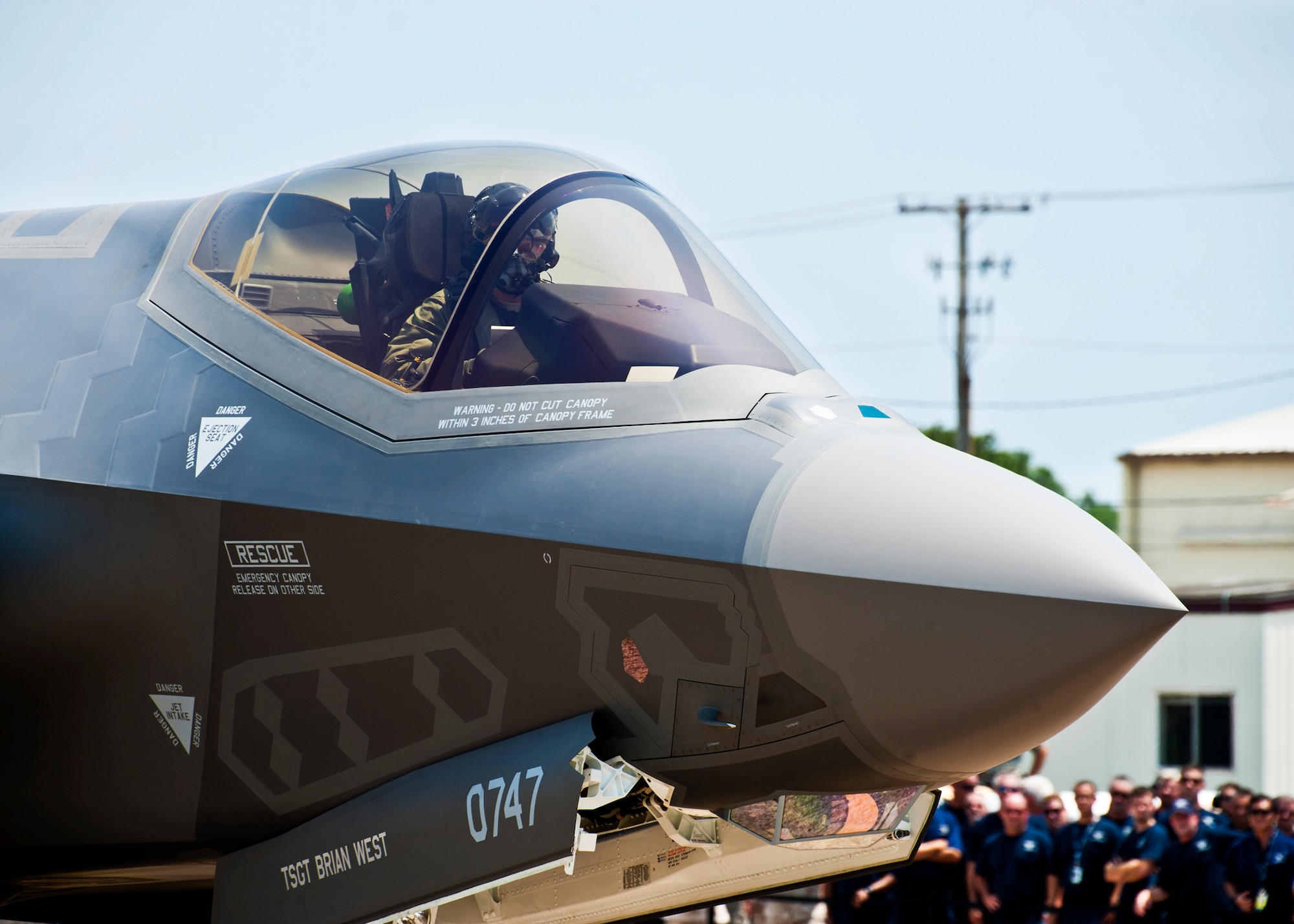 Members of the 33rd Fighter Wing came out to see DoD’s newest aircraft, the F-35 Lightning II joint strike fighter, when it arrived to its new home at Eglin Air Force Base, Fla., July 14. (U.S. Air Force photo/Samuel King Jr.)