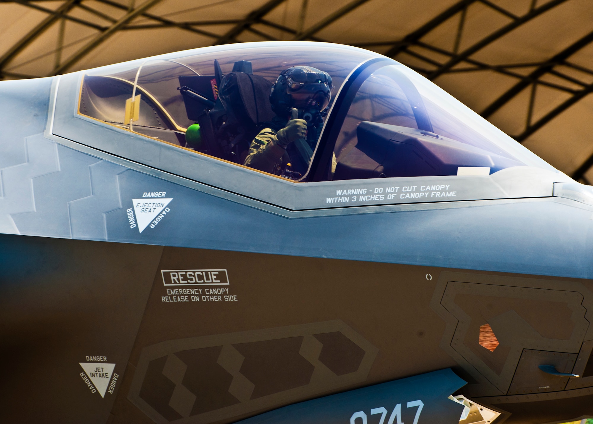 The Air Force’s first joint strike fighter pilot, Lt. Col. Eric Smith, of the 58th Fighter Squadron, taxis his squadron’s newest aircraft, the F-35 Lightning II, to its new home at Eglin Air Force Base, Fla., July 14.  (U.S. Air Force photo/Samuel King Jr.)