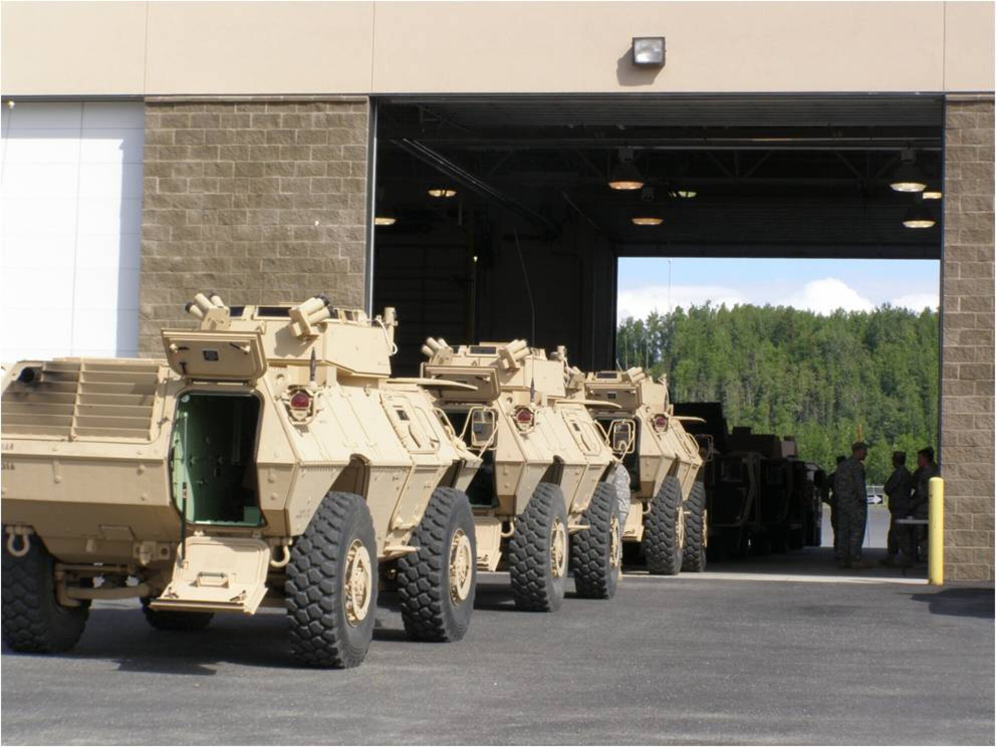 M-1117 Armored Support Vehicles are processed by 773d Logistics Readiness Squadron personnel for deployment overseas. The LRS is responsible for processing all equipment for deployment movements. (courtesy photo)