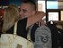 Tech. Sgt. Chris Noll, a fuels management flight member with the 940th Logistics Readiness Squadron, steps off an escalator into the waiting arms of his wife, Karissa, at the Sacramento International Airport, July 13, 2011. Several members of the 940th Wing, a Reserve unit at Beale Air Force Base, Calif., were also on hand to welcome Noll home from a year-long deployment to Joint Base Balad in Iraq where he served with the 332nd Air Expeditionary Wing. (U.S. Air Force photo by Dana Lineback/released) 