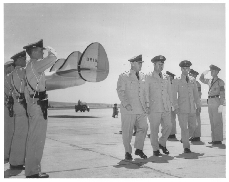 Gen. Nathan F. Twining, Air Force Vice Chief of Staff, Lt. Gen Gen. Curtis E. LeMay and Brig Gen. C. J. Bondley Jr. step off a plane at Spokane Air Force Base to attend the dedication ceremony July 20, 1951. Spokane Air Force Base was officially named Fairchild during the base dedication ceremony. The base was named for Gen. Muir S. Fairchild, former Vice Chief of Staff of the Air Force and a Bellingham, Wash., native. (Historical photo)