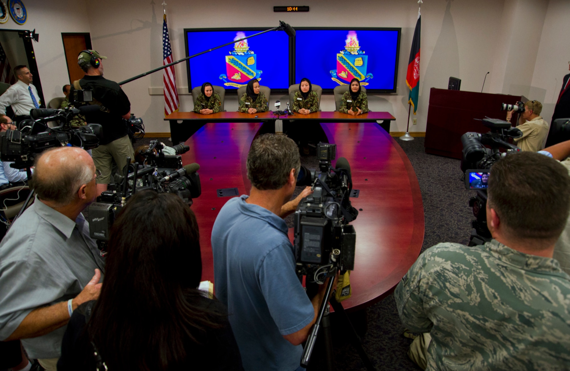 Four Afghan helicopter pilot candidates answer questions for local media during a press conference July 13, 2011, at the Defense Language Institute English Language Center at Lackland Air Force Base, Texas. The women are at the ELC for English language courses before going to Fort Rucker, Ala., for helicopter training. The students are the first female pilot candidates from their country to attend DLI’s English language program. (U.S. Air Force photo/Senior Airman Marleah Miller)