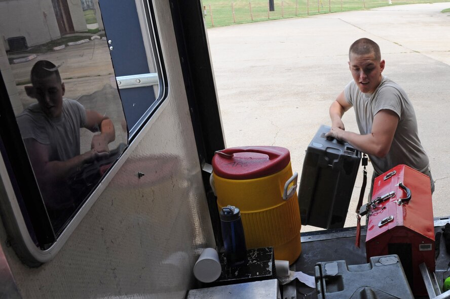 Airman 1st Class David Kuape, 2nd Maintenance Squadron, secures a composite tool kit in the back of a truck on Barksdale Air Force Base, La., July 14. A composite tool kit inventory is completed after every job to ensure all tools are accounted for. The tools could potentially damage an aircraft or personnel if left behind.  (U.S. Air Force photo/Airman 1st Class Micaiah Anthony)(RELEASED)