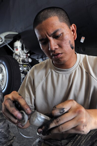 Airman 1st Class Justen Laganse, 2nd Maintenance Squadron, inspects an apex case in a hangar on Barksdale Air Force Base, La., July 14. A composite tool kit inventory is completed after every job to ensure all tools are accounted for. The tools could potentially cause damage to an aircraft or personnel if left behind.  (U.S. Air Force photo/Airman 1st Class Micaiah Anthony)(RELEASED)