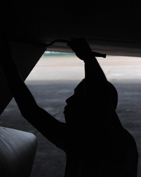 Staff Sgt. Raymond Villamor, 2nd Maintenance Squadron, uses a speed handle to tighten a screw on a B-52H Stratofortress in a hangar on Barksdale Air Force Base, La., July 14. The 2 MXS recently switched from a 350-hour phase inspection to a 450-hour phase inspection. The increase in phase hours allows more work to be completed without sacrificing quality. (U.S. Air Force photo/Airman 1st Class Micaiah Anthony)(RELEASED)