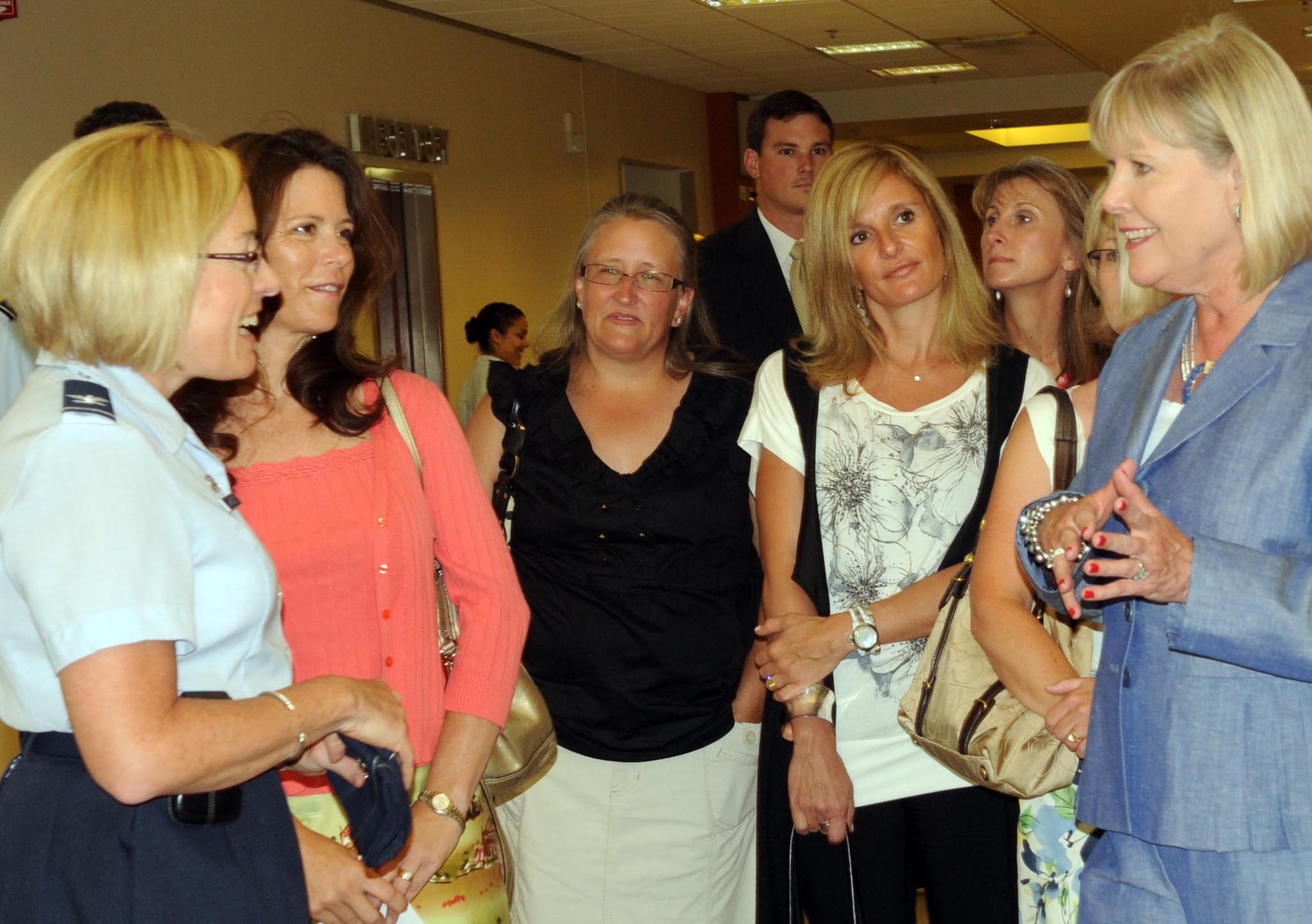 Col. Linda Lawrence (left), the 31st Medical Group commander at Aviano Air Base, Italy, briefs Suzie Schwartz, wife of the Air Force Chief of Staff Gen. Norton Schwartz, on medical services at Aviano July 11, 2011. The general and his wife were visiting Aviano to meet with Airmen and their families and observe the installation’s mission.  (U.S. Air Force photo/Airman Briana N. Jones)