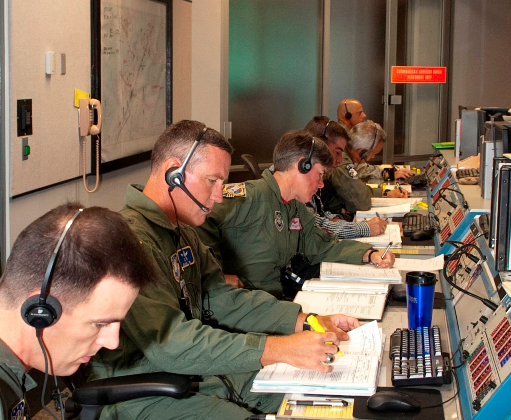 Air Force 45th Space Wing Leadership in the Morrell Operations Center Control Room 2, Cape Canaveral AFS, FL, provide flawless Eastern Range support for the successful launch of Space Shuttle Atlantis July 8, 2011. NASA, the wing and their Mission Partners supported STS-135, the final mission of the Space Shuttle program. (Air Force photo/Matthew Jurgens)
