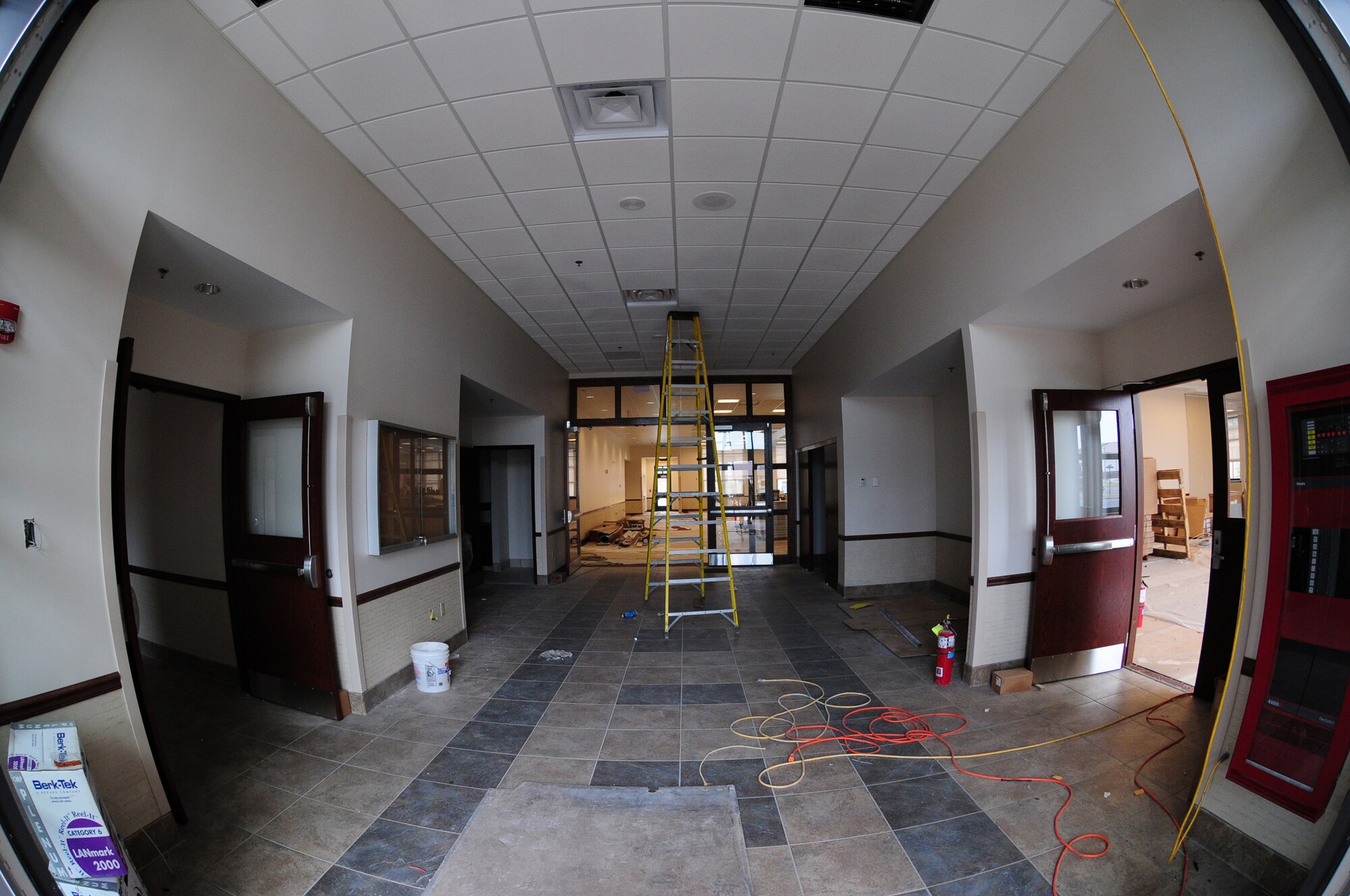 Construction workers are busy getting the Community Activities Center (CAC) ready for completion at the Niagara Falls Air Reserve Station, N.Y. on July 11, 2011.  The CAC will replace the old 1950s era dining hall with a new, bigger modern facility.  The 18,000 square foot, $10.3 million project is slated to open in mid August. (U.S. Air Force Reserve Photo by Peter Borys)