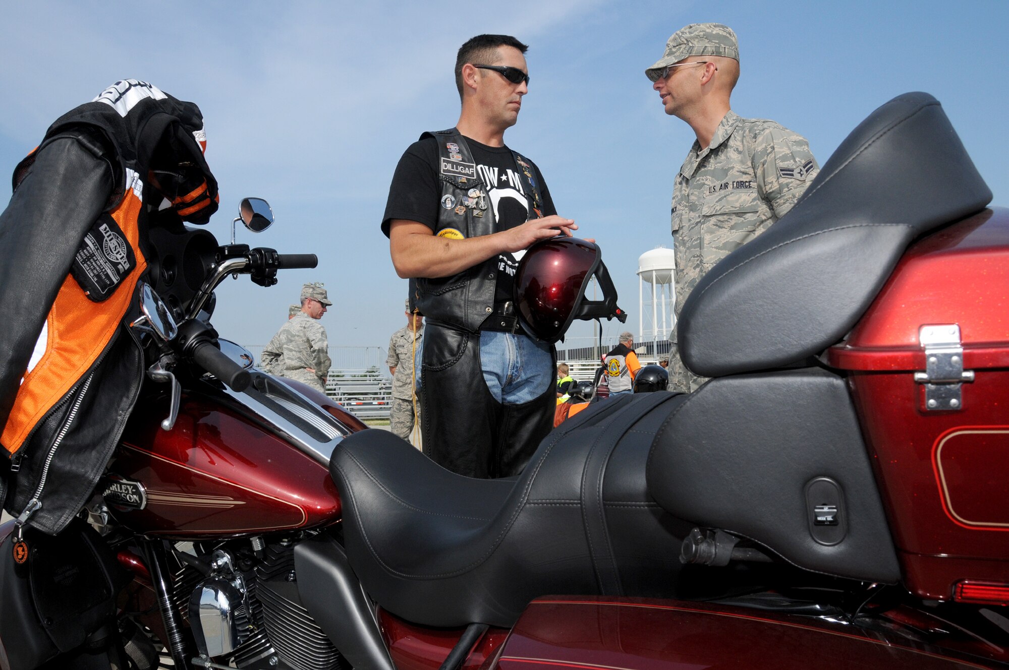 Master Sgt. Christopher Walton, left, 334th Training Squadron first sergeant, talks to Airman 1st Class Kevin Schenck, a student in the 338th TRS, at the motorcycle safety ride organized by the 336th Training Squadron that took place after Friday's drill down.   (U.S. Air Force photo by Kemberly Groue)