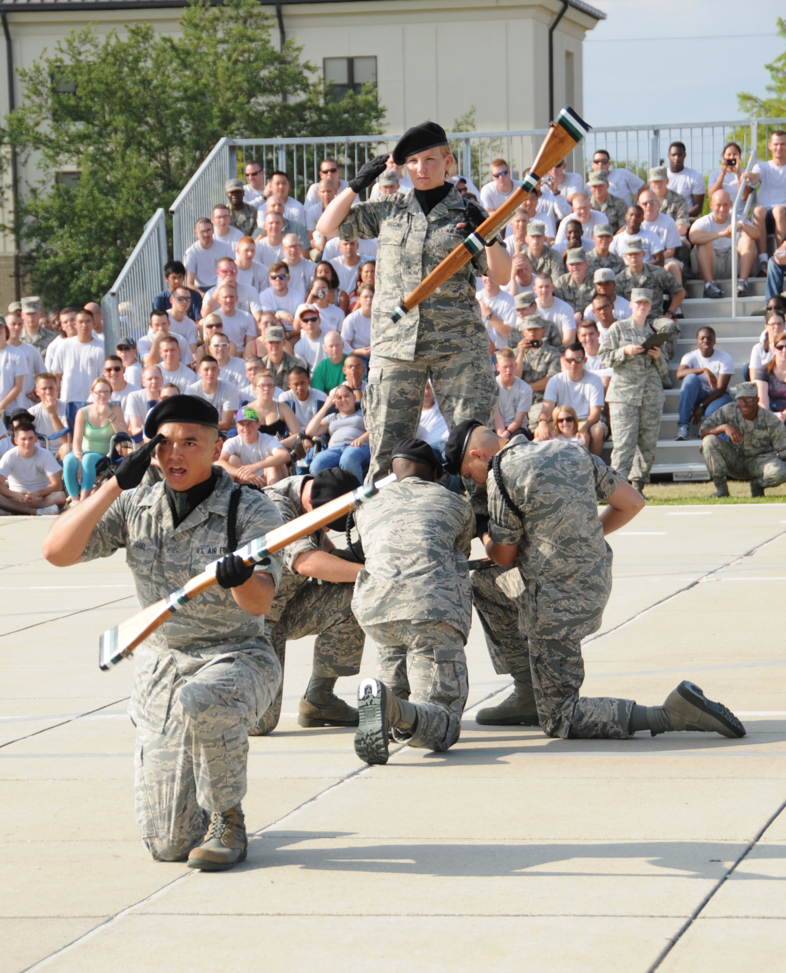 Airmen 1st Class Joel Novosel, left, and Sarah Huggins, top, perform with their 334th Training Squadron teammates during the freestyle competition Friday.  (U.S. Air Force photo by Kemberly Groue)