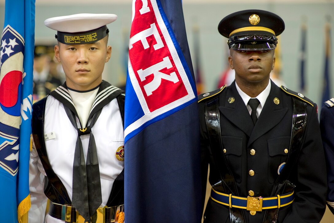 South Korean and U.S. color guard members participate in the U.S. Forces Korea change-of-command ceremony at U.S. Army Garrison Yongsan in Seoul, South Korea, July 14, 2011. 
