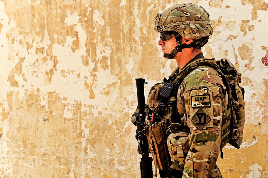 U.S. Army Capt. Devin Ciminero watches his sector while serving as personal security for the civil affairs team in the Alingar district of Afghanistan's Laghman province, July 13, 2011. Ciminero is the company commander of the Laghman Provincial Reconstruction Team.