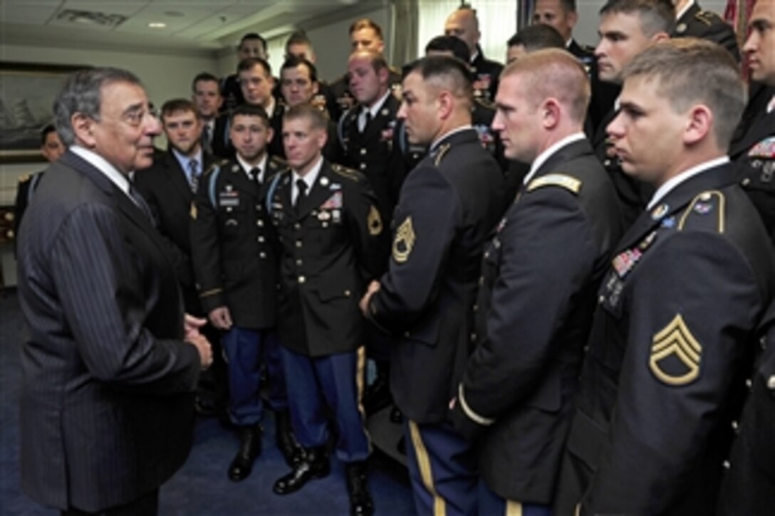 Members of the 75th Ranger Regiment who served with Medal of Honor recipient Sgt. 1st Class Leroy Petry in Afghanistan meet with Secretary of Defense Leon E. Panetta in his office in the Pentagon on July 13, 2011.  