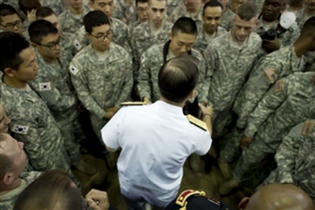 Chairman of the Joint Chiefs of Staff Adm. Mike Mullen greets service members during an all hands call at U.S. Army Garrison Yongsan, Seoul, South Korea, on July 14, 2011.  