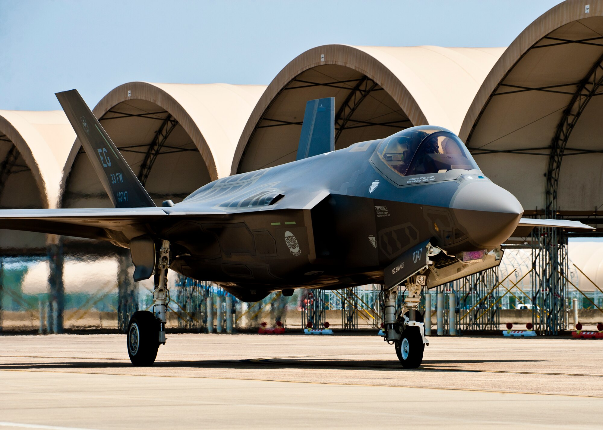 DoD's newest aircraft, the F-35 Lightning II joint strike fighter, taxis across the 33rd Fighter Wing flightline at Eglin Air Force Base, Fla., July 14.  (U.S. Air Force photo/Samuel King Jr.)