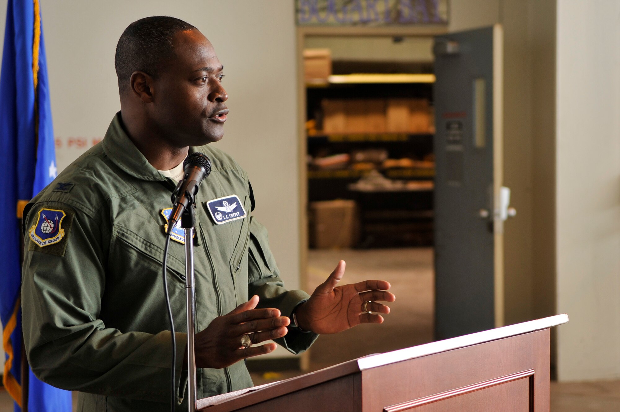VANDENBERG AIR FORCE BASE, Calif. -- Col. Lavanson Coffey III, the 30th Launch Group commander, speaks during the opening of the 30th LCG Bogart Bay ribbon cutting ceremony here Friday, July 15, 2011.  The 30th LCG Bogart Bay provides a system of training components for 30th LCG members to gain experience and knowledge to use for mission critical hardware.  (U.S. Air Force photo/Staff Sgt. Andrew Satran) 

 
 