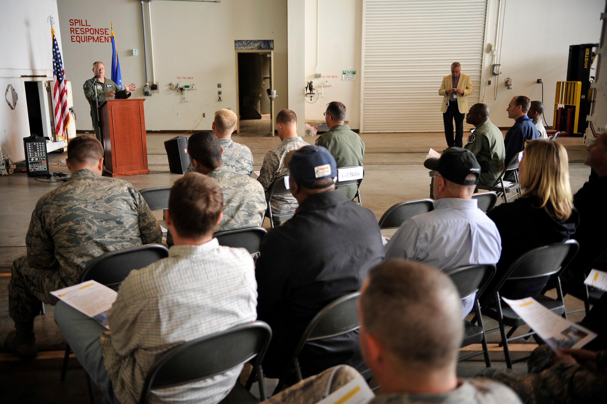 VANDENBERG AIR FORCE BASE, Calif. -- Lt. Col. Jenns Robertson, a 30th Launch Group member, speaks to an audience during the opening of the 30th LCG Bogart Bay ribbon cutting ceremony here Friday, July 15, 2011.  Bogart Bay is a training facility that allows 30th LCG members to practice lesson plan modules in order to meet training needs.  (U.S. Air Force photo/Staff Sgt. Andrew Satran) 

 