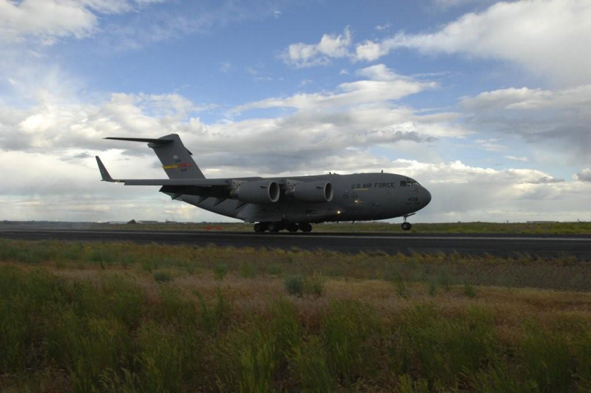 A March Air Reserve Base C-17 Globemaster III touches down at Moses Lake, Wash., this month during short-field landing practice by the 452nd Air Mobility Wing’s 2011 Rodeo aircrew. The Air Mobility Command-sponsored, international airlift and airdrop competition is scheduled to be held July 23-30 at Joint Base Lewis-McChord, Wash.    (U.S. Air Force photo / Capt. Eric Ozols)
