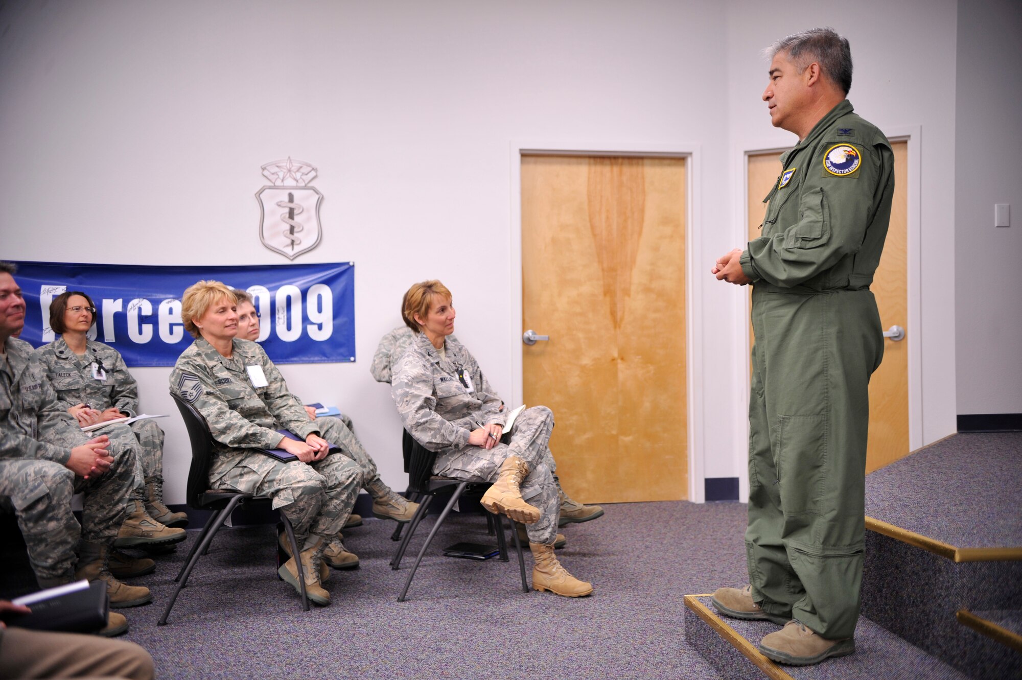 VANDENBERG AIR FORCE BASE, Calif. -- Col. Chris Torres, an Air Force Health Services team chief, speaks to the 30th Medical Group during the Health Services Inspection outbrief here Friday, July 15, 2011.  The 30th MDG received an overall rating of outstanding, the highest rating for this type of inspection.  (U.S. Air Force photo/Staff Sgt. Andrew Satran) 

 