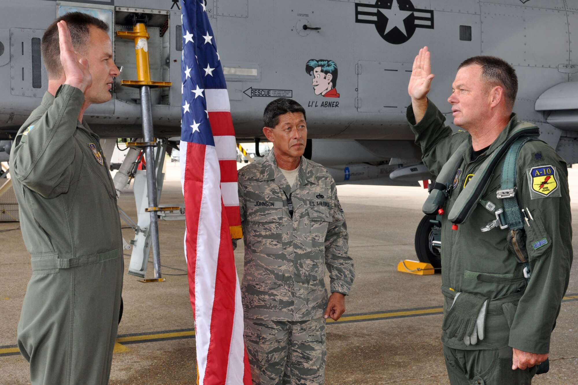 Lt. Col. James Macaulay, the deputy commander for the 917th Fighter Group, takes the oath during a pinning-on ceremony at Barksdale Air Force Base, La., July 15, 2011. Col. Eric Overturf, commander, 442nd Fighter Wing, Whiteman Air Force Base, Mo., was the presiding official for the ceremony. Approximately 100 family members and friends were in attendance. (U. S. Air Force photo/Tech. Sgt. Jeff Walston)