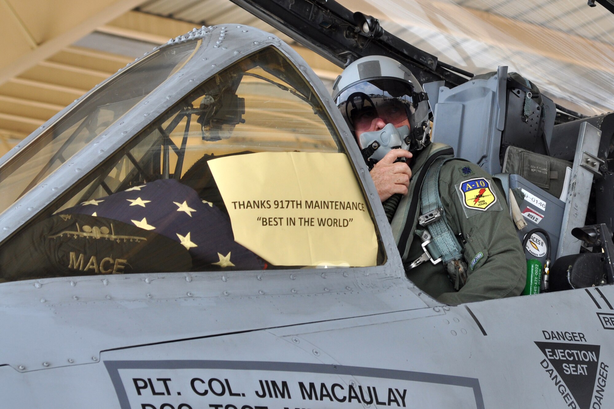 Lt. Col. James Macaulay, the deputy commander for the 917th Fighter Group, passes on a message to members of the 917th Maintenance Squadron after his “fini flight” at Barksdale Air Force Base, La., July 15, 2011. Colonel Macaulay participated in a four-ship flight during which the pilots surpassed the 20,000 combined hours mark—a feat never before accomplished by four pilots in the A-10. (U.S. Air Force photo/Tech. Sgt. Jeff Walston) 