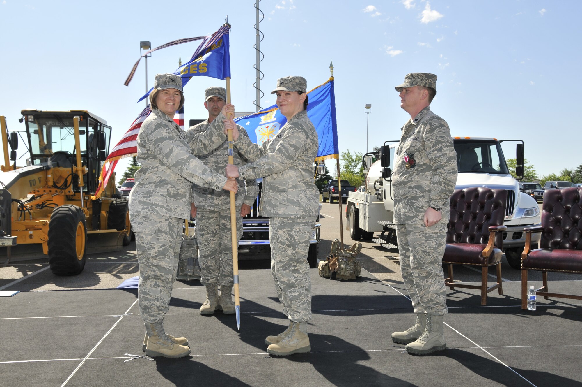 Lt. Col. Sarah Christ (right) accepts command of the 341st Civil Engineer Squadron from Col. Angela Stout, 341st Mission Support Group commander, July 12 at Medal of Honor Park. 341st CES First Sergeant Master Sgt. Britt Bare and outgoing 341st CES commander Lt. Col. Joseph Brands look on. (U.S. Air Force photo/John Turner)