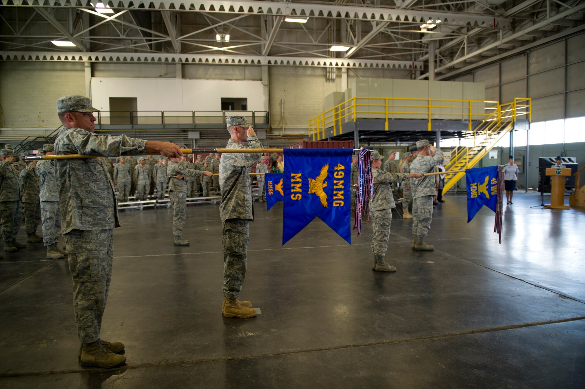 HOLLOMAN AIR FORCE BASE, N.M. -- Members of the 49th Materiel Maintenance Group present arms July 14, 2011, during the 49th MMG change of command ceremony. Col. Masao Hendrix relinquished command of the 49th MMG to Col. James Krajewski. Prior to becoming the 49th MMG commander, Colonel Krajewski was the director of logistics and the assistant chief of staff, logistics, Air Component Command at Osan Air Base, Republic of Korea. (U.S. Air Force photo by Airman 1st Class Joshua Turner/Released)