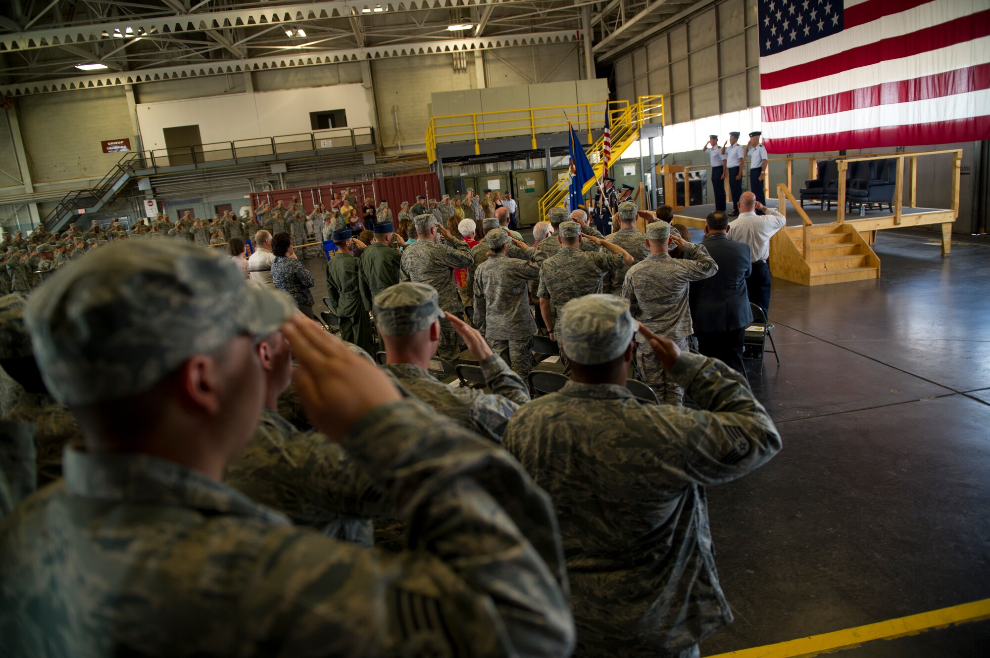 HOLLOMAN AIR FORCE BASE, N.M. -- Members of the 49th Materiel Maintenance Group render a salute July 14, 2011, during the 49th MMG change of command ceremony. Col. Masao Hendrix relinquished command of the 49th MMG to Col. James Krajewski. Prior to becoming the 49th MMG commander, Colonel Krajewski was the director of logistics and the assistant chief of staff, logistics, Air Component Command at Osan Air Base, Republic of Korea. (U.S. Air Force photo by Airman 1st Class Joshua Turner/Released)