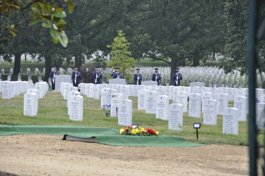 Maj. Richard G. Elzinga, missing in action, was honored a 21-gun salute by Bolling Air Force Base Honor Guard during a graveside inurnment service July 8, 2011 at Arlington National Cemetery. All repatriated MIAs receive full military honors. (U.S. Air Force photo/Capt. Pamela Stauffer)