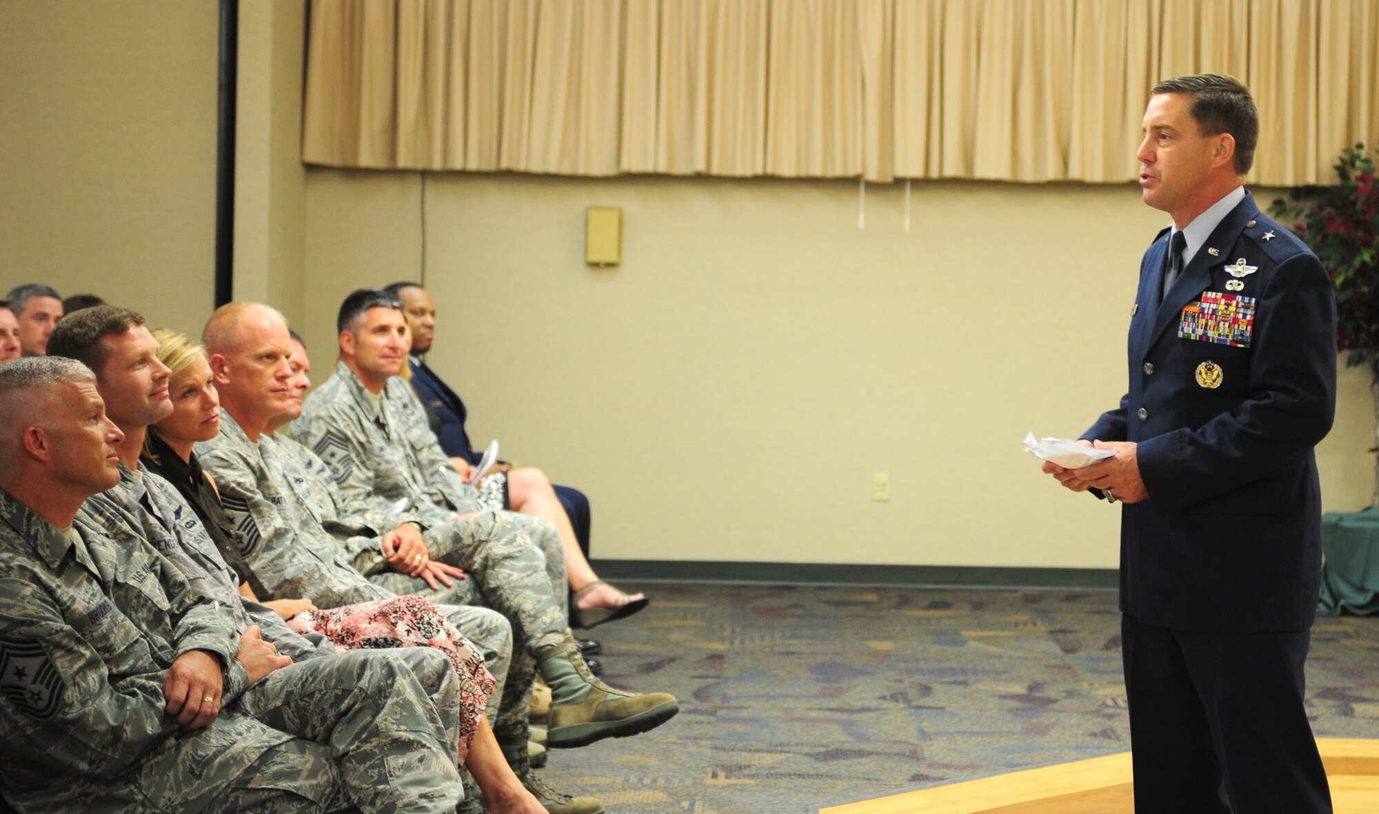 U.S. Air Force Brig. Gen John Horner, 93rd Air Ground Operations Wing commander, gives thanks to his family, friends, co-workers and everyone in attendance during his promotion ceremony at Moody Air Force Base, Ga., July 14, 2011. Horner will depart Moody after two years of service here to serve as the director of Intelligence, Surveillance and Reconnaissance Capabilities in Washington, D.C. (U.S. Air Force photo by Senior Airman Stephanie Mancha/Released)