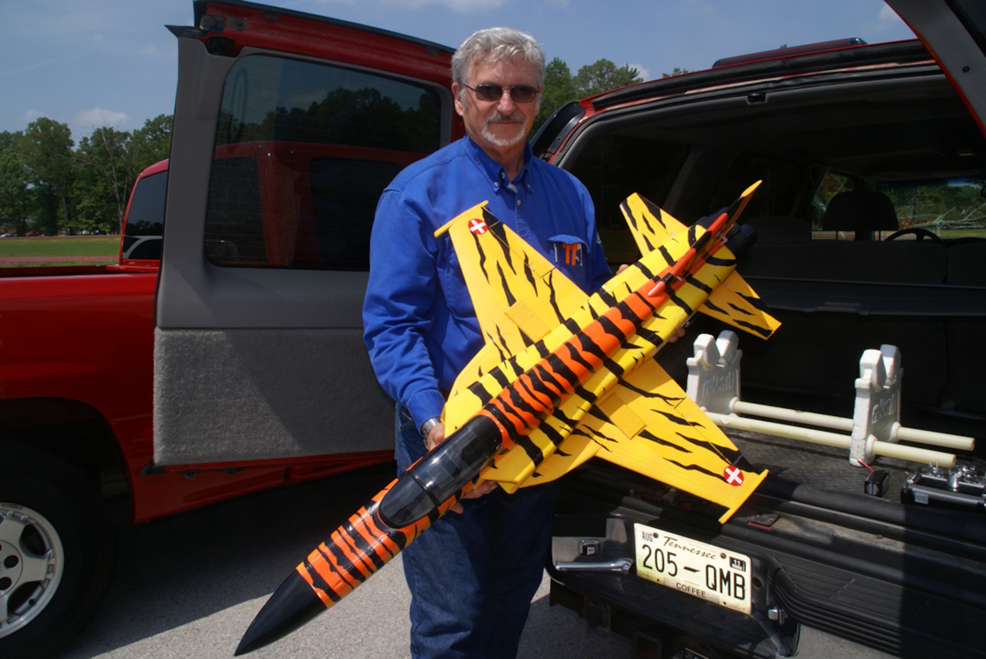 Rich Eichel, a member of the ATA safety staff, holds one of his newer model aircraft to fly at the Coffee Airfoilers Model Airplane Club. (Photo by Philip Lorenz III)