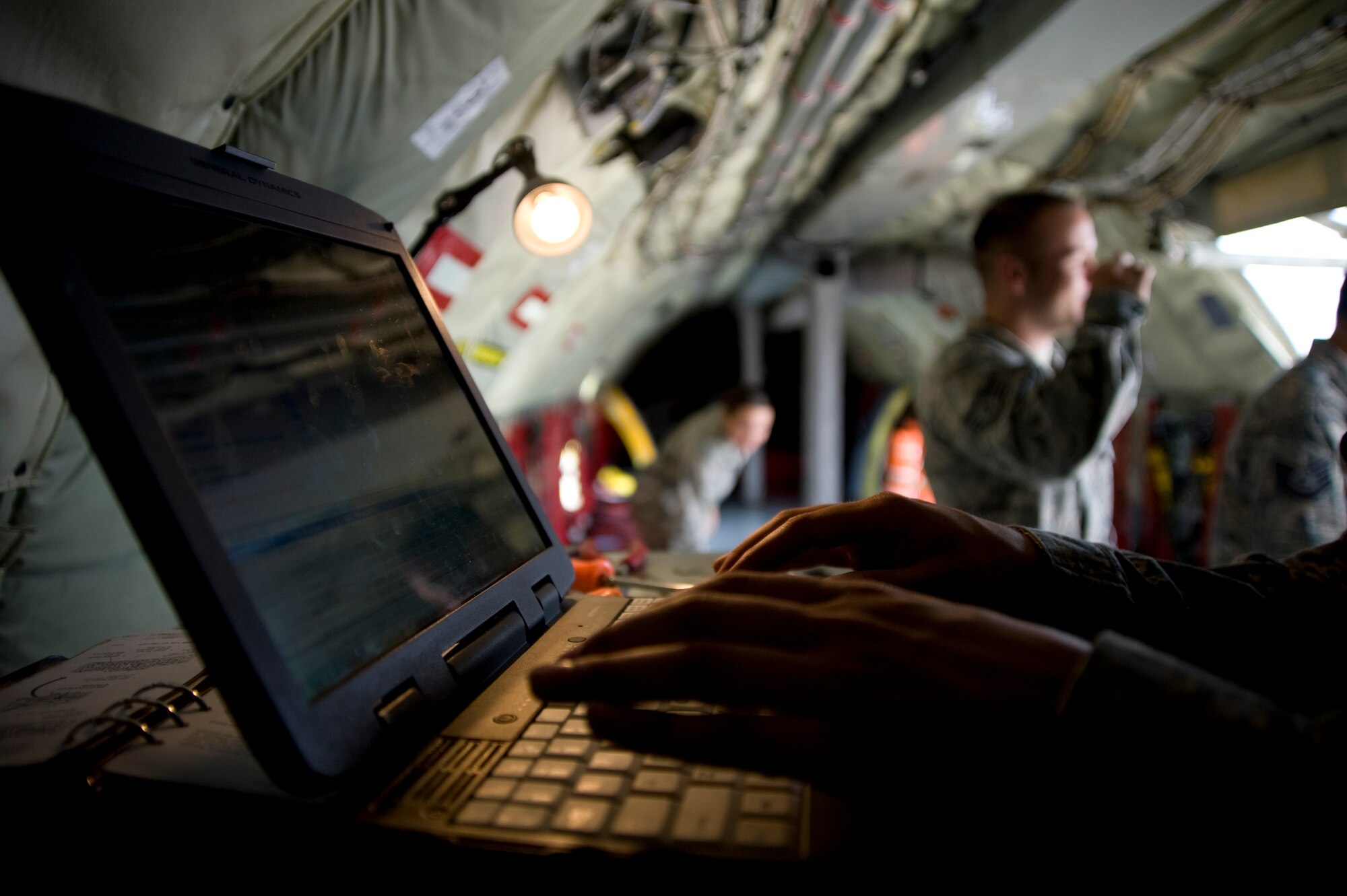 After tasks are finished, the 2011 RODEO maintenance team logs their work July 6, 2011, McConnell Air Force Base, Kan. RODEO is an Air Mobility Command competition established in 1962 to test the skills of mobility Airmen. (U.S Air Force photo/Airman 1st Class Armando A. Schwier-Morales) 