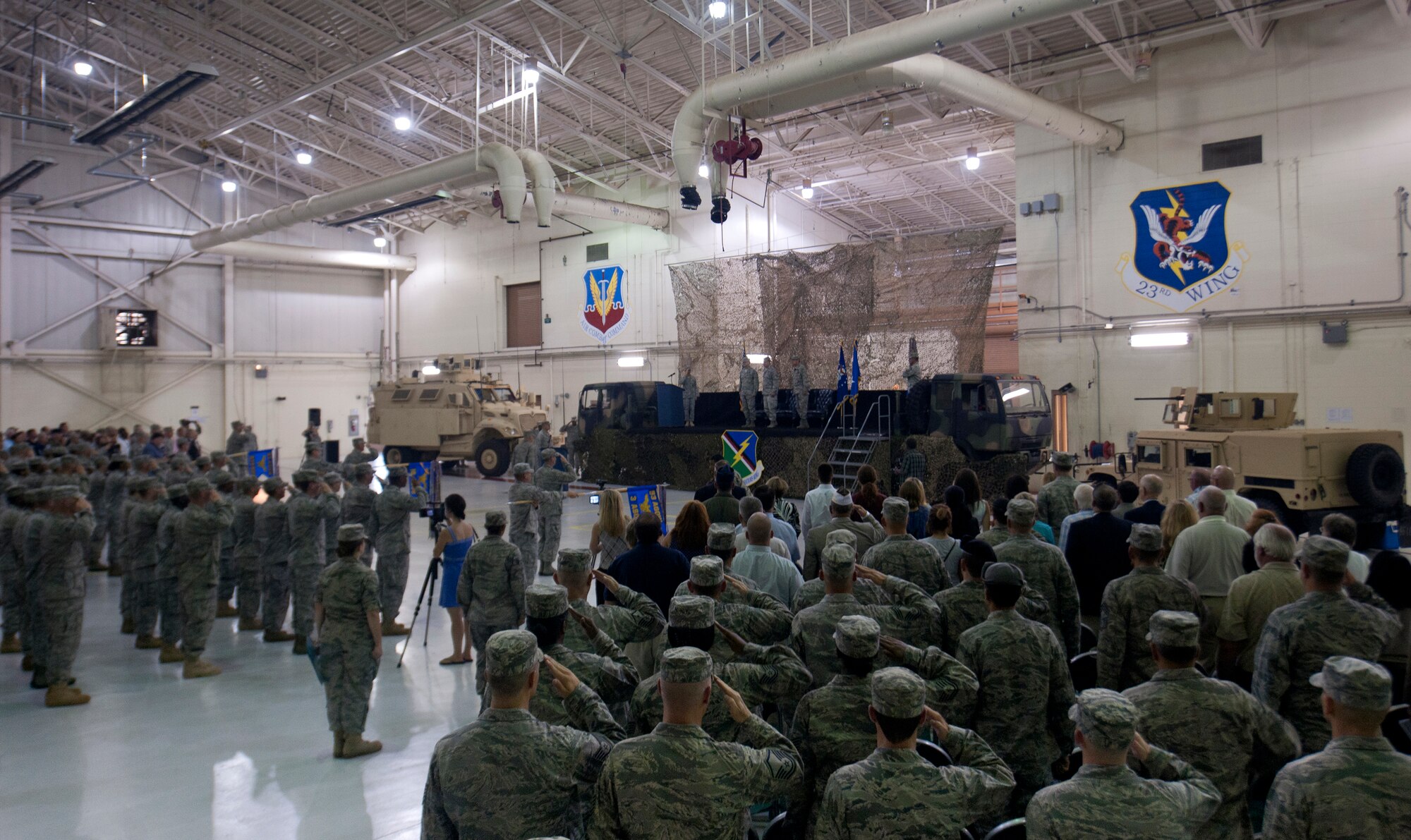 U.S. Air Force members render salutes during the arrival of the official party during the 93rd Air Ground Operations Wing change of command ceremony at Moody Air Force Base, Ga., July 15, 2011. Maj. Gen. Stephen Hoog, 9th Air Force commander, served as the presiding officer for the event. (U.S. Air Force photo by Airman 1st Class Joshua Green/Released)
