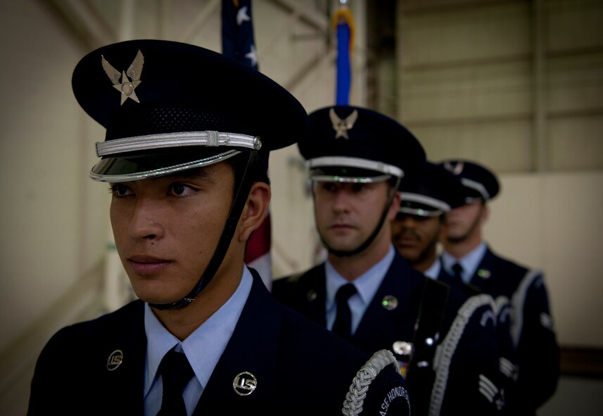 U.S. Air Force Senior Airman Casey Scaffide, Moody Air Force Base Honor Guard, and other honor guard members prepare to present the colors for the 93rd Air Ground Operations Wing change of command ceremony at Moody Air Force Base, Ga., July 15, 2011. During the ceremony, Brig. Gen. John Horner relinquished command to Col. Scott Kindsvater. (U.S. Air Force photo by Airman 1st Class Joshua Green/Released)
