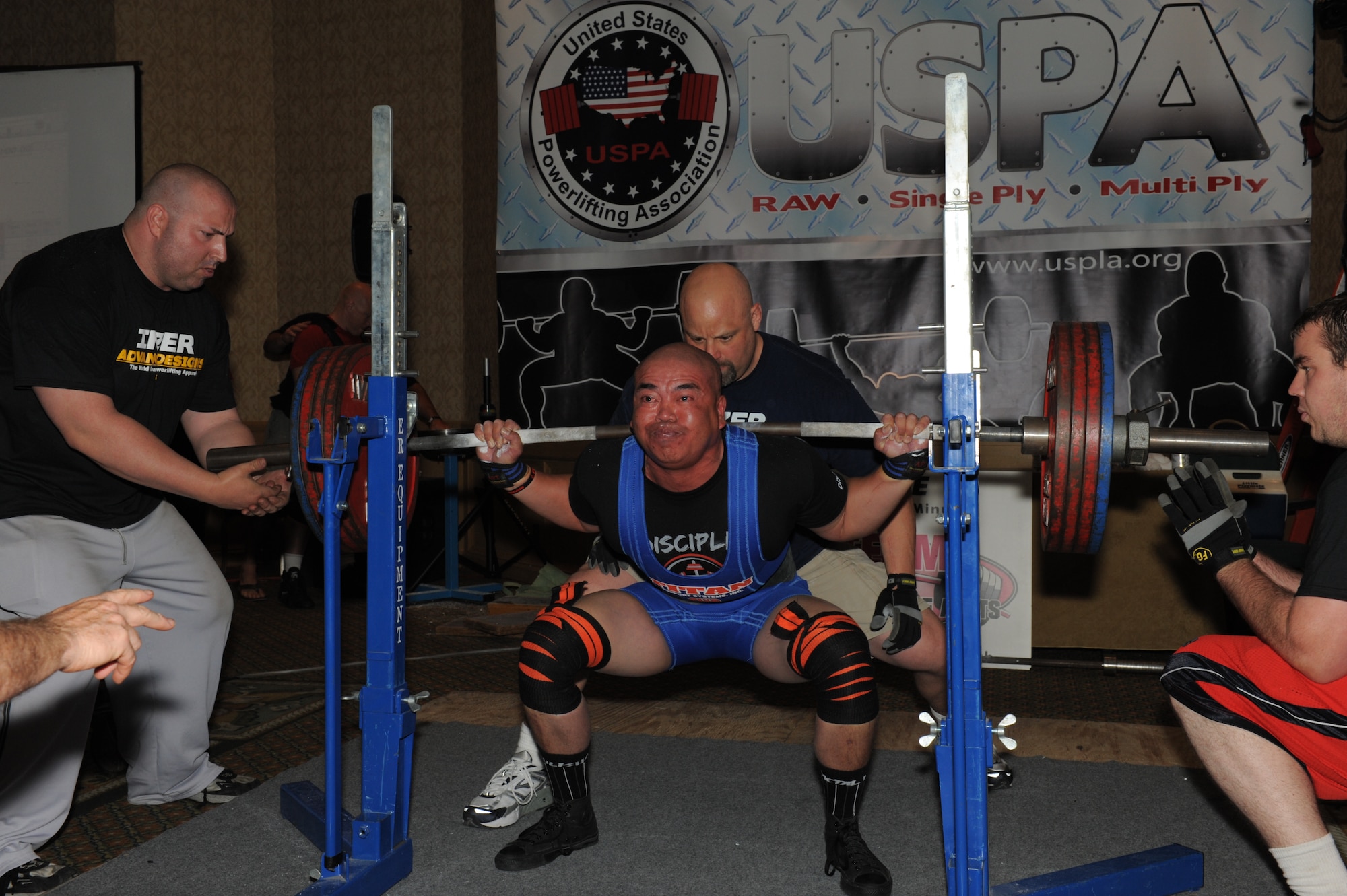 U.S. Air Force Tech. Sgt. Rudy Garcia, 99th Ground Combat Training Squadron NCO in charge of combat arms, squats 480 pounds during the United States Powerlifting Association National and Military National Powerlifting Championships held July 1-3, 2011, in Costa Mesa, Calif.  This squat allowed Garcia to set a new USPA American record while competing in the 181-pound Full Power Submaster Division for 35- to 39-year-olds.  (Courtesy Photo)