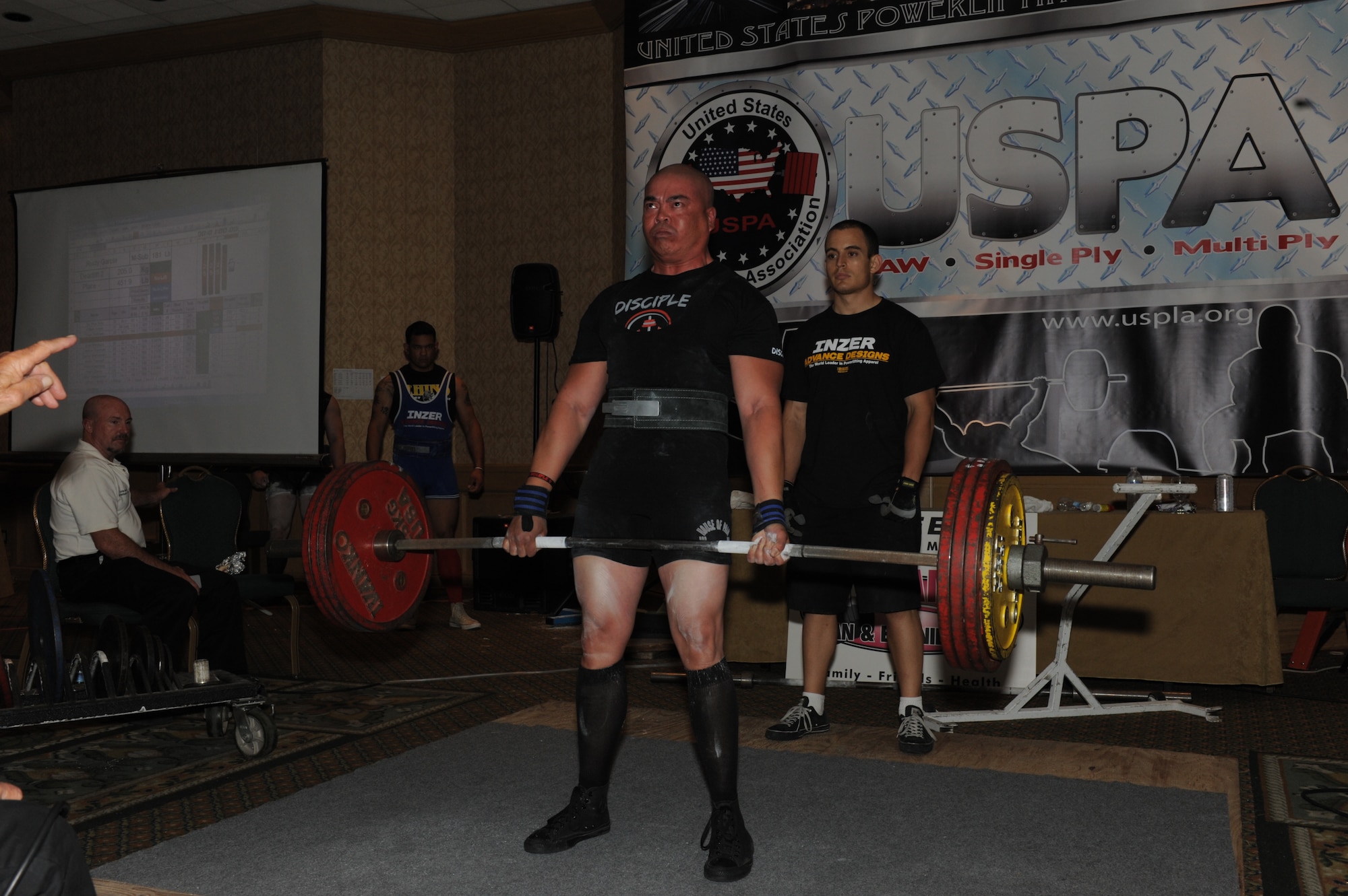 U.S. Air Force Tech. Sgt. Rudy Garcia, 99th Ground Combat Training Squadron NCO in charge of combat arms, dead-lifts 451 pounds during the United States Powerlifting Association National and Military National Powerlifting Championships held July 1-3, 2011, in Costa Mesa, Calif.  During the championships, Garcia set a new USPA American record when he squatted 480 pounds while competing in the 181-pound Full Power Submaster Division for 35- to 39-year-olds.  (Courtesy Photo)