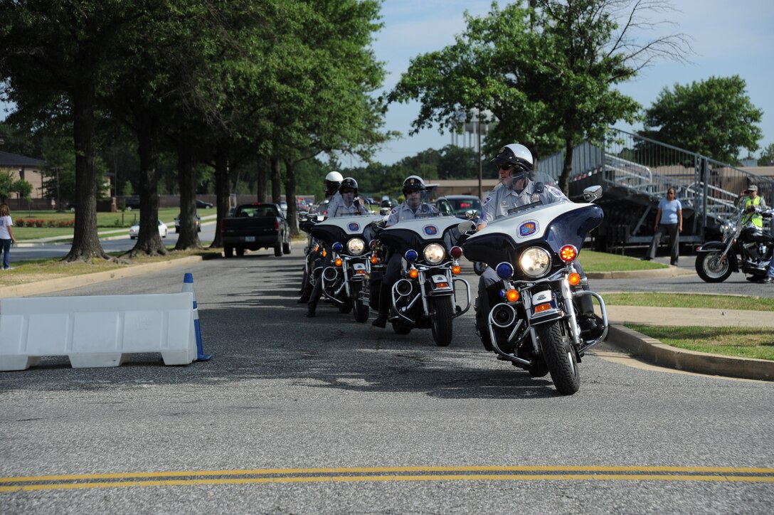 Prince George's County Police depart on a group ride at the Joint Base Andrews Motorcycle Safety Day on July 15.  The event was designed to improve the safety of riders on JBA in conjunction with the Air Force's Year of Motorcycle Safety. (U.S. Air Force photo by Senior Airman Torey Griffith)